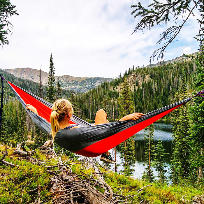 woman outdoors in her hammock